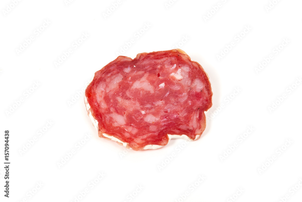 pile of red salami, on a white pile of red salami, on a white