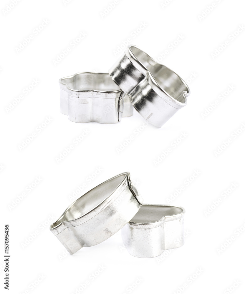 Pile of metal cookie cutters isolated Pile of metal cookie cutters isolated