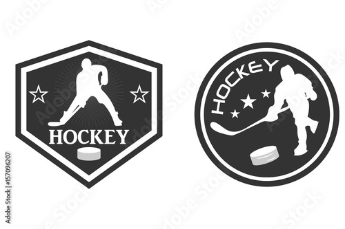 hockey logo. the player with the stick. washer. monochrome vector illustration.