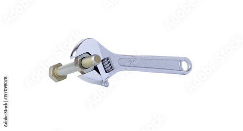Spanner, bolt and nut on white background