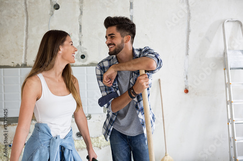 Beautiful young couple renovating their home