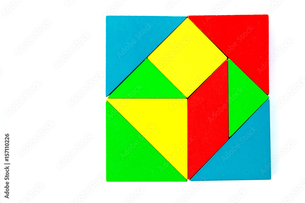 Wooden colorful toy block in multiple shape build to square design on white background Wooden colorful toy block in multiple shape build to square design on white background