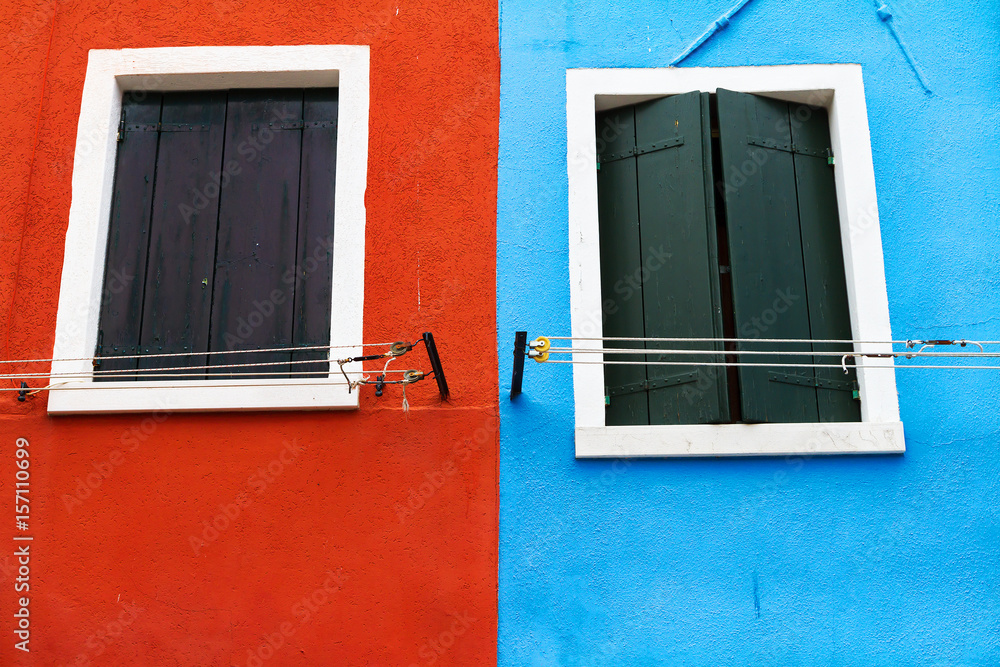  Burano island, traditional colourful walls of the common old houses.
