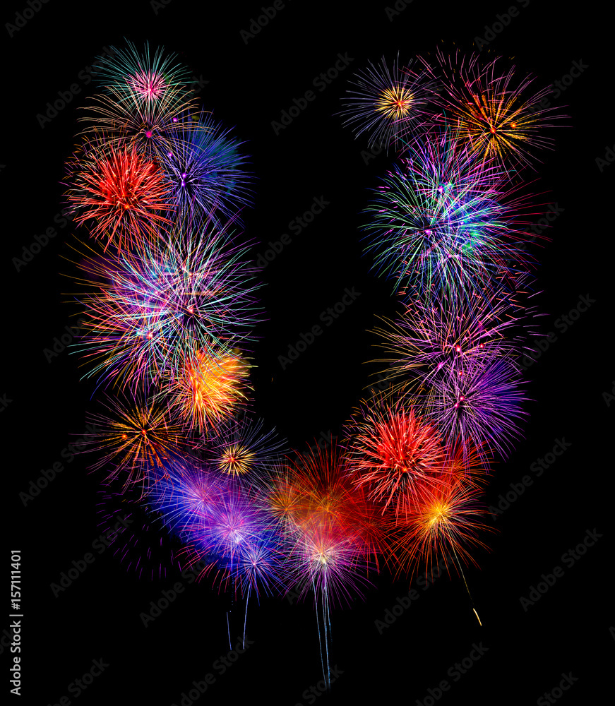 colorful fireworks.alphabet U-  beautiful colorful firework isolated display for special  celebration on black isolated background