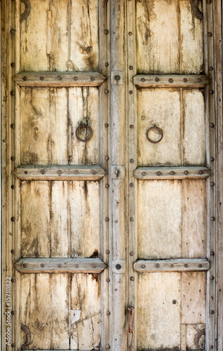 Vintage Style old wooden door on background