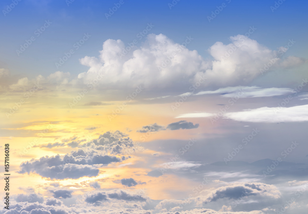 sunset clouds sky skyscape. view from the window of an airplane flying in the clouds, top view clouds like  the sea of clouds sky background