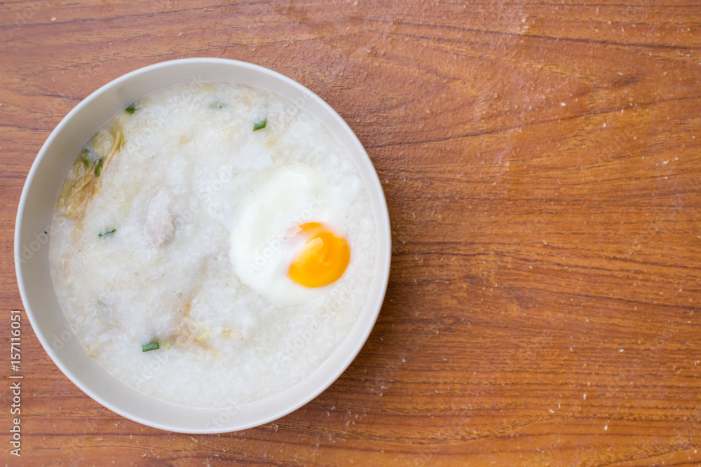 Pain rice porridge with boiled egg for breakfast Pain rice porridge with boiled egg for breakfast