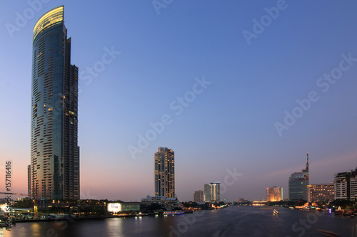 The business skyscraper on Satorn road in city downtown at sunset time.
 photo