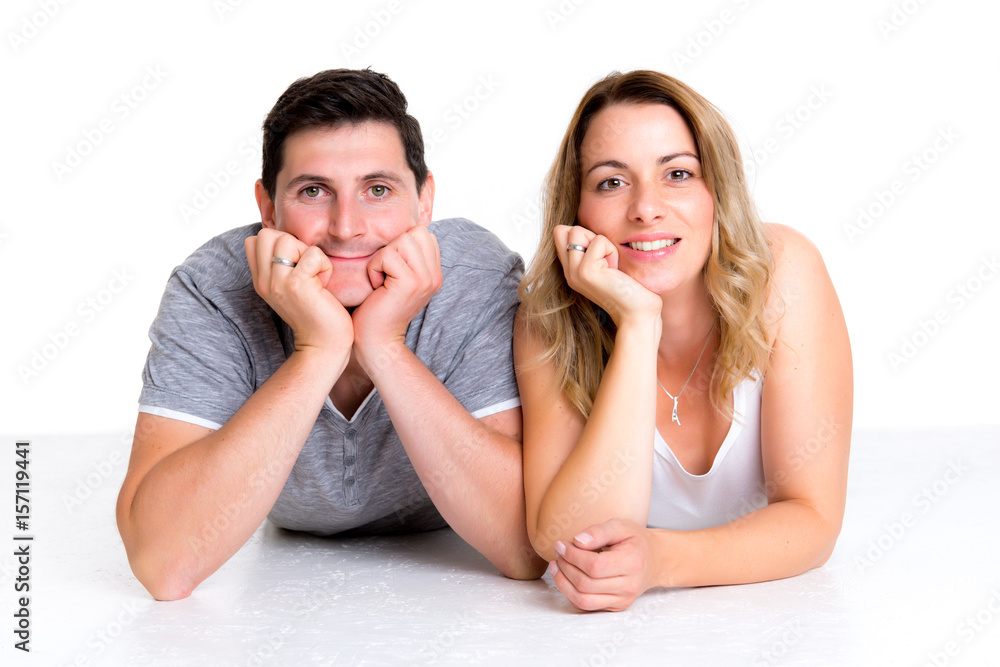 young couple in front of bright background young couple in front of bright background