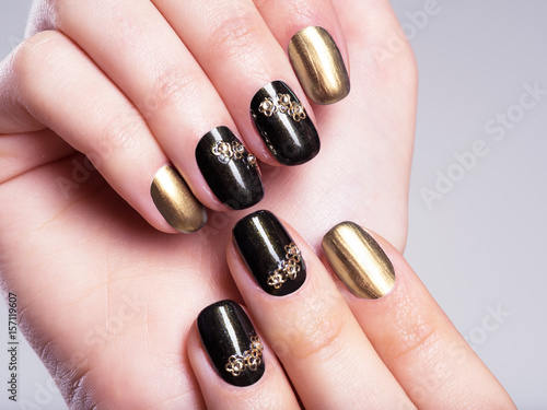 Beautiful woman s nails with beautiful creative manicure