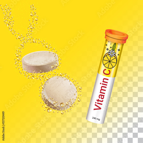 Multivitamin effervescent tablet pills. Vitamin C soluble pills with lemon flavour in water with sparkling fizzy bubbles trail