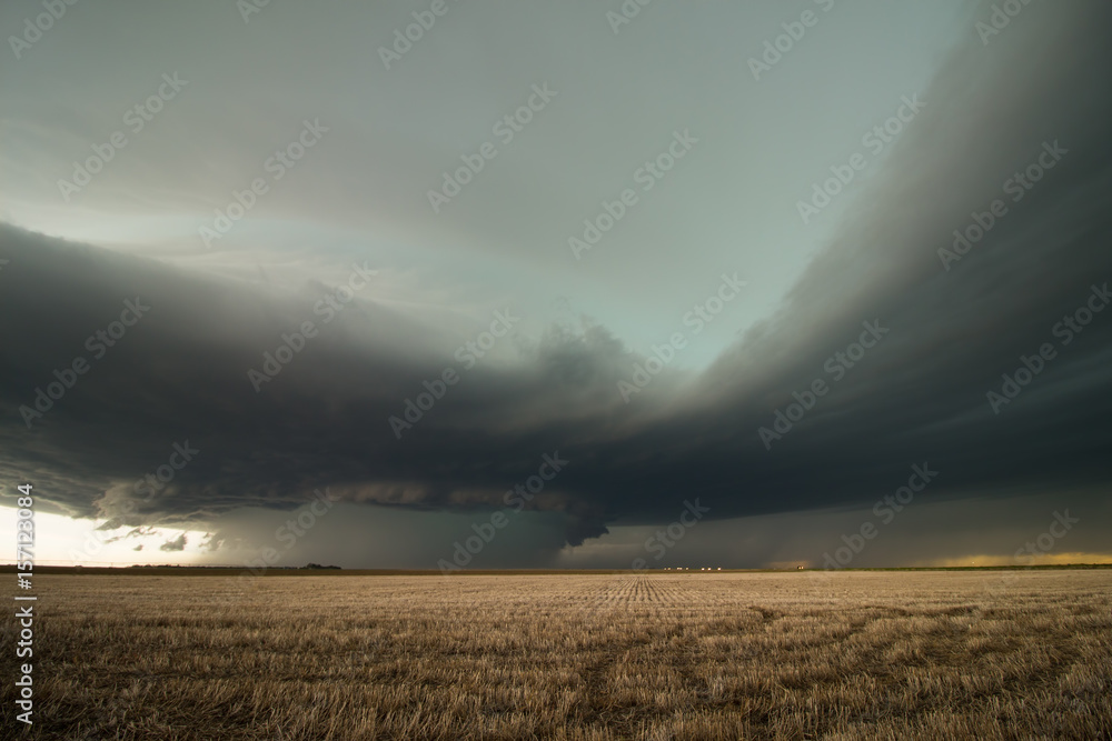 A monstrous supercell thunderstorm gathers strength over the plains of eastern Colorado.