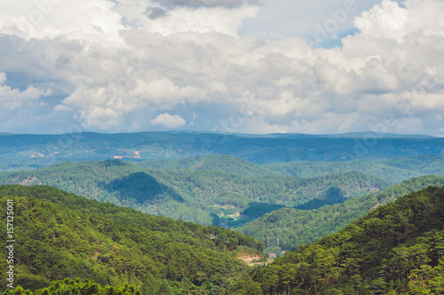 Fantastic landscape of Dalat Mountains, Viet Nam, fresh atmosphere, villa among forest, impression shape of hill and mountain from high view, wonderful vacation for ecotourism in spring photo