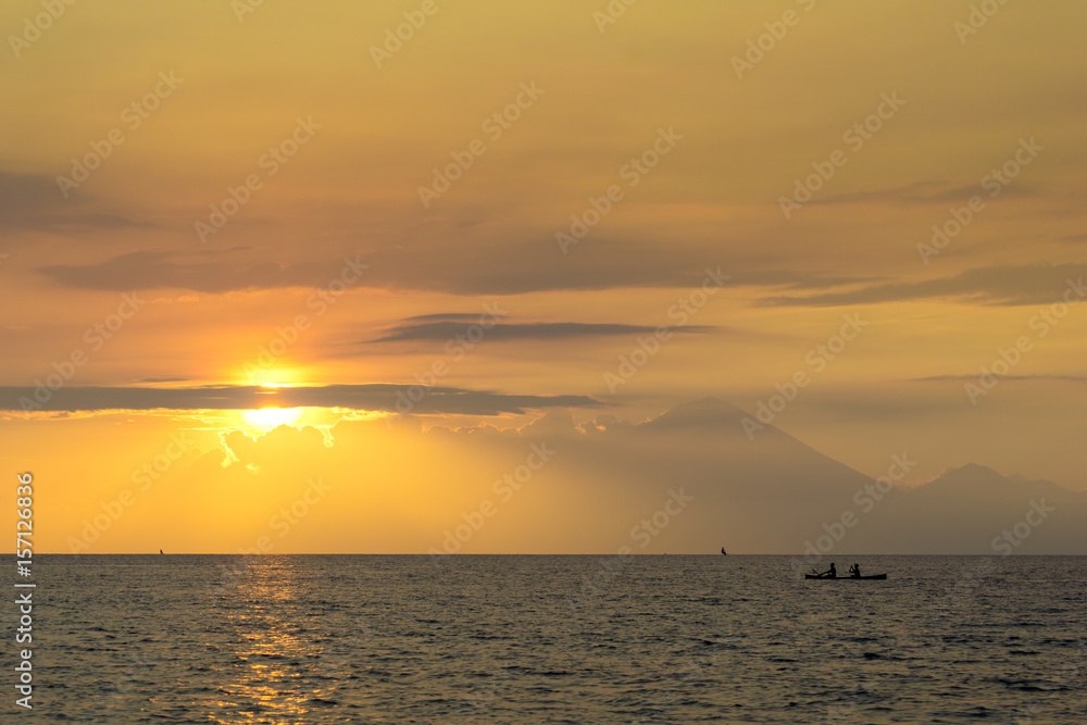 Traditional fisherman during majestic sunset in Lombok, Indonesia Traditional fisherman during majestic sunset in Lombok, Indonesia