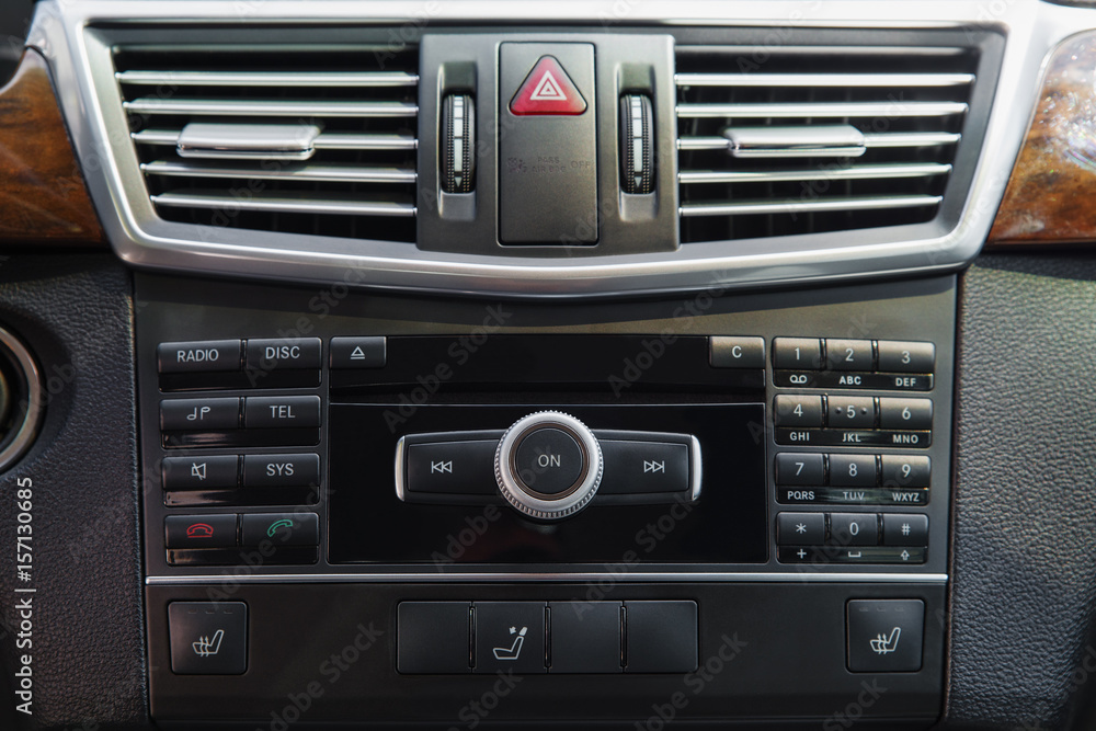 media system on the control panel of the car, the management console, emergency stop button, car interior