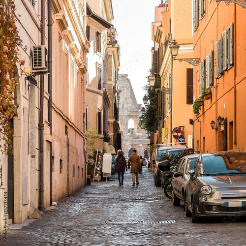 Photography ROME. People on the street with view on Coliseum in Rome, one of