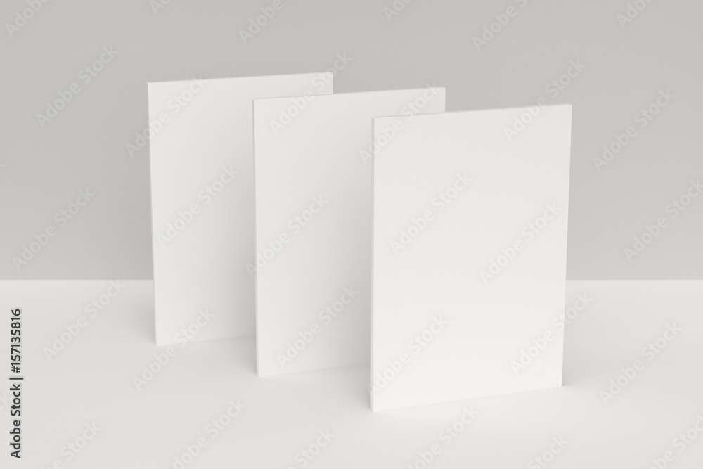 Three blank white closed brochure mock-up on white background Three blank white closed brochure mock-up on white background