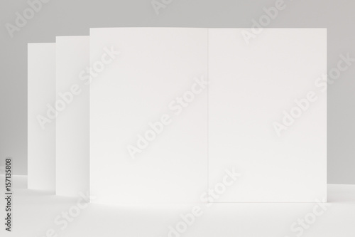 Three blank white open brochure mock-up on white background © GooD_WiN