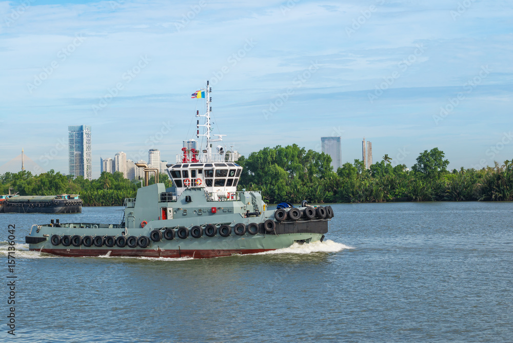 Harbor tugs, River tugs for to assist cargo ship in landing berth in Thailand. Harbor tugs, River tugs for to assist cargo ship in landing berth in Thailand.
