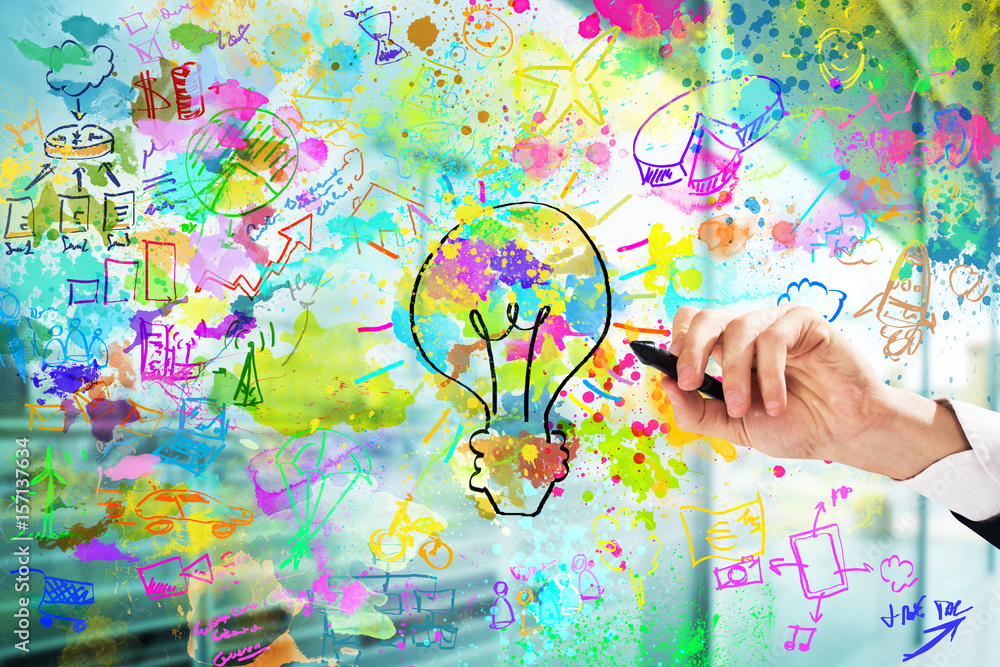 Businessman draws a creative business project Businessman draws a creative business project