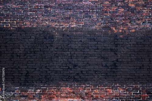 Antique brick wall texture stone facade of the building