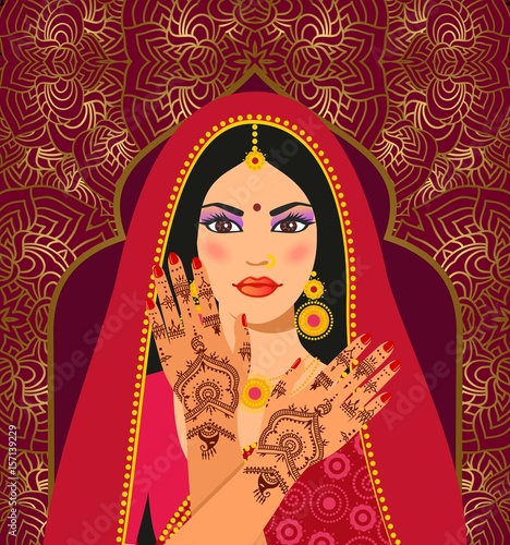 Beautiful Indian brunette young woman in  sari. Hands with mehndi pattern