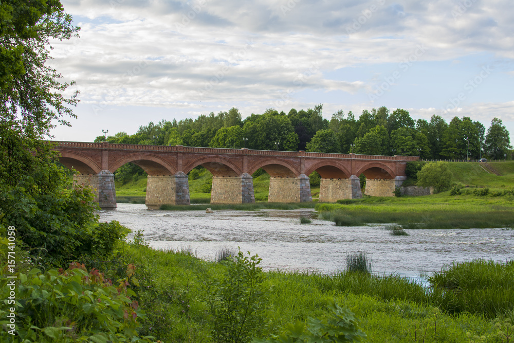 Brick bridge across river Venta. Latvia