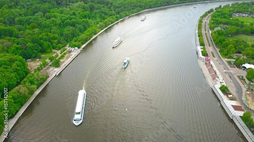 Aerial shot of Moscow river tour boats near Vorobievy Gory recreation area photo