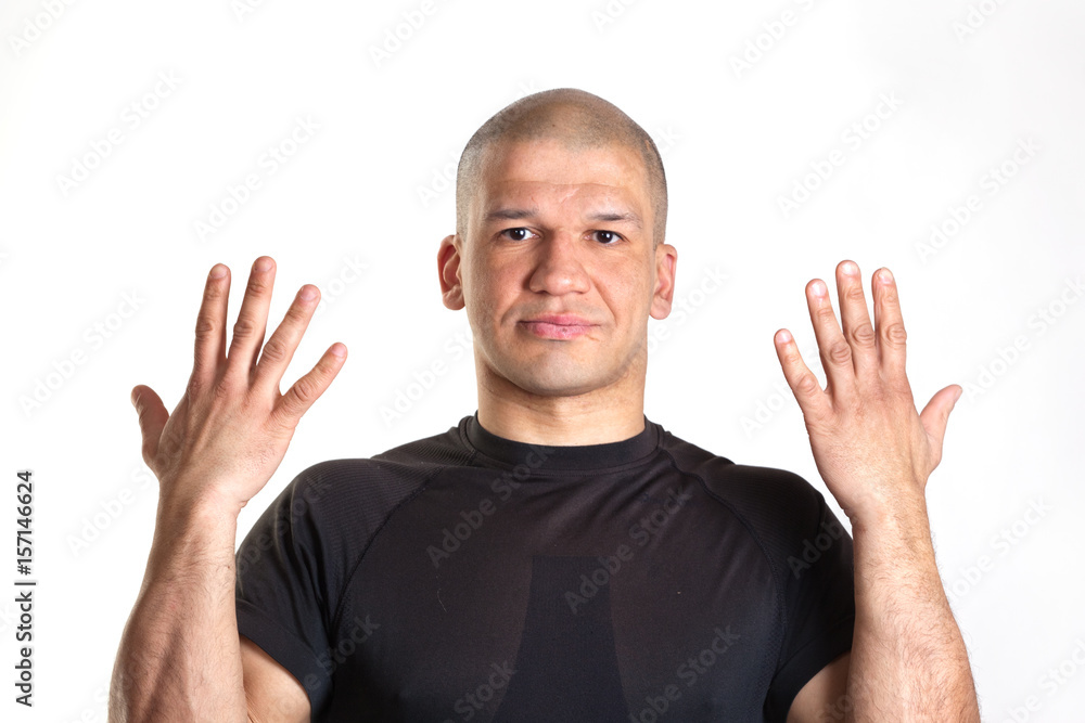 Portrait of a cheerful man showing palms Portrait of a cheerful man showing palms