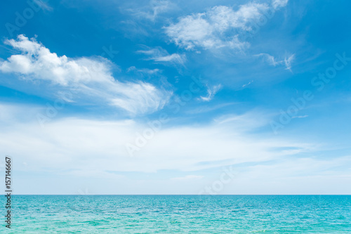Scenic landscape of turquoise sea , blue sky and white clouds in sunny day, beautiful nature background or backdrop for holiday vacation and summer travel concepts © Panot