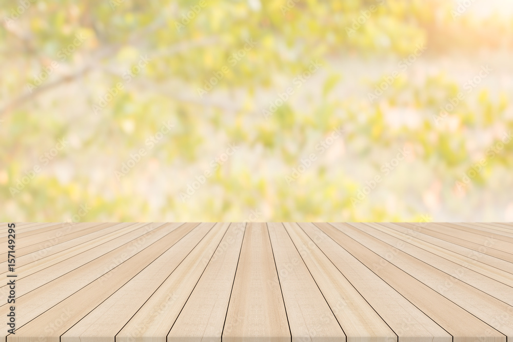 Empty table top on blurred nature background,Space for placing products,Warm light from the sunset Empty table top on blurred nature background,Space for placing products,Warm light from the sunset