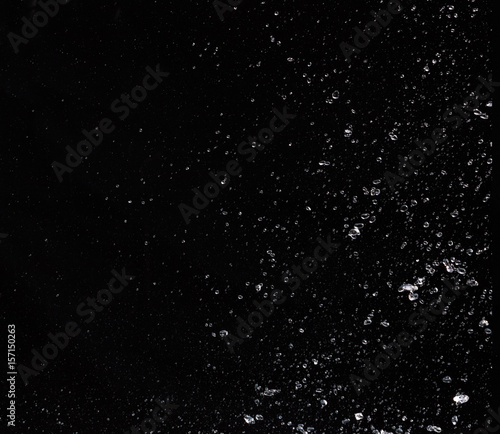 Water splash on black background