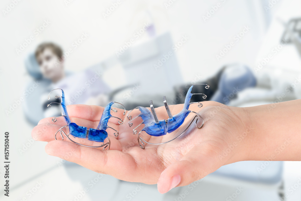 Orthodontic treatment closeup in a doctor's office Orthodontic treatment closeup in a doctor's office