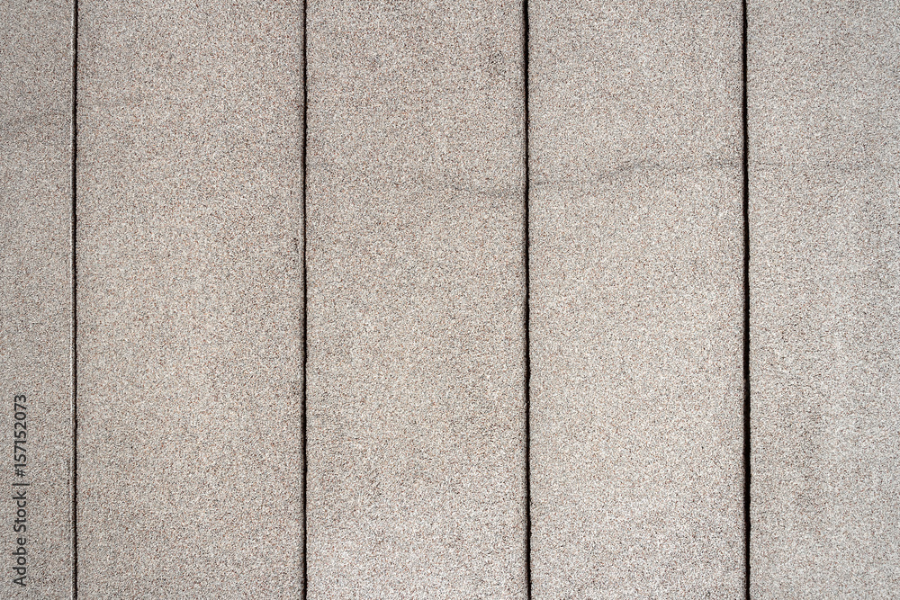 Fototapeta premium Closeup of lined concrete wall texture