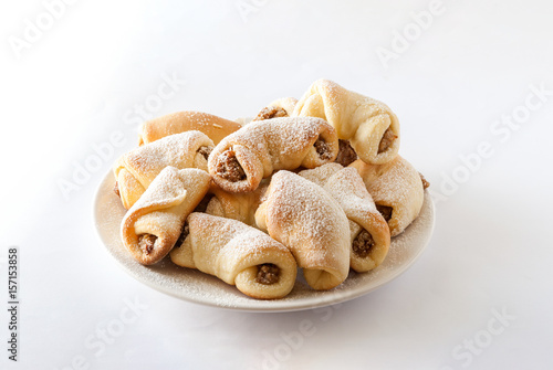Homemade walnut snacks on white background