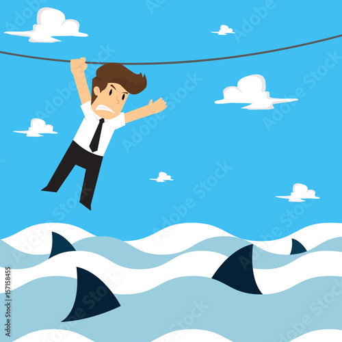 businessman climbing a rope, the risk in the sea