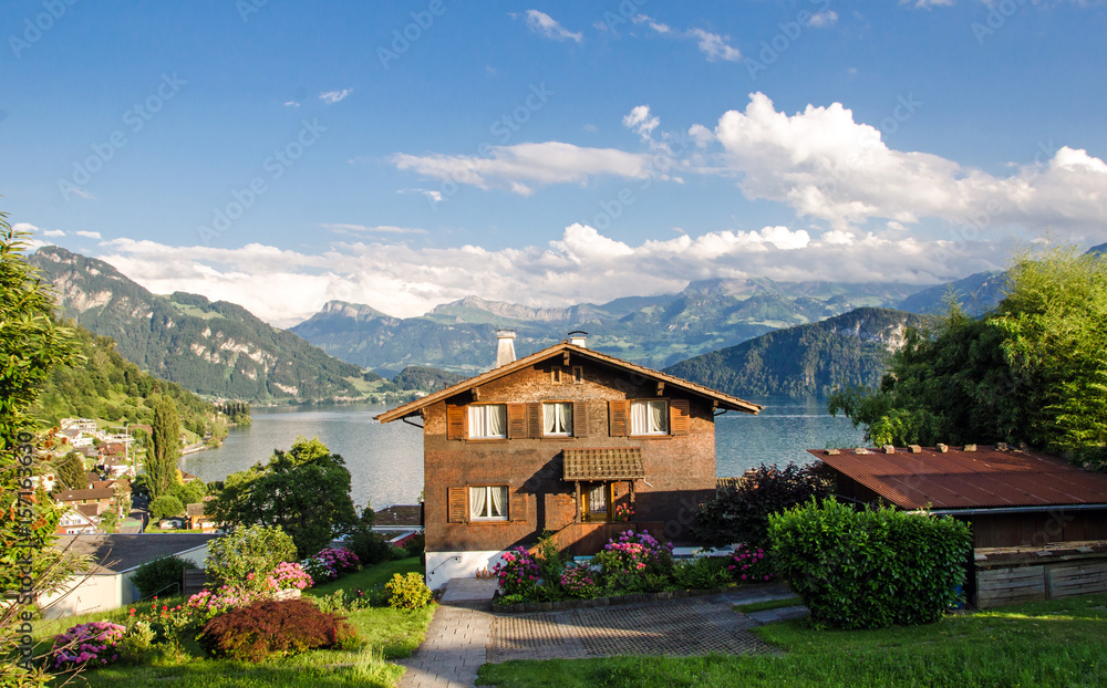 Swiss mountain hut on a lake with a wonderful garden :)