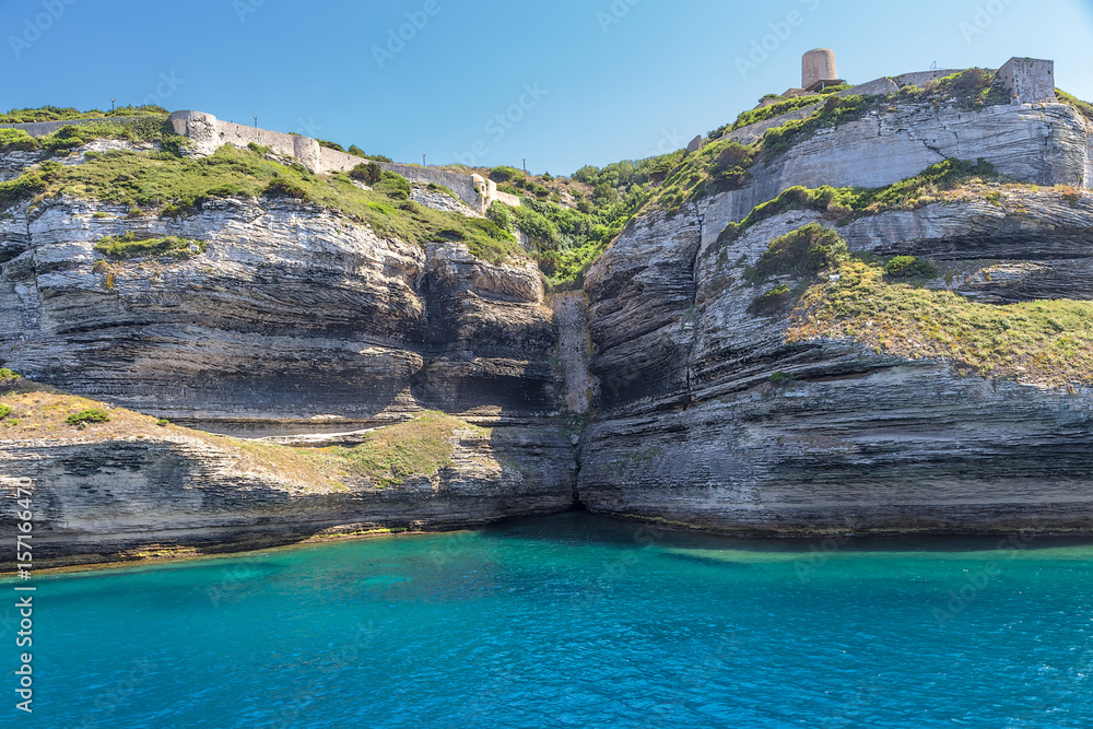 Island of Corsica, France. Ancient fortifications on a rocky shore in Bonifacio