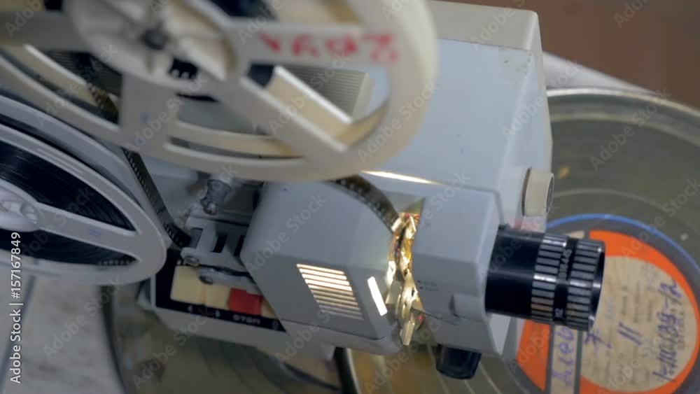 Old-fashioned film projector in operation Old-fashioned film projector in operation