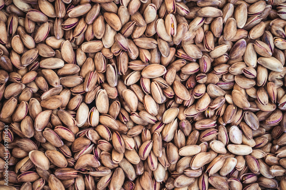Pistachios as a background, backdrop or wallpaper. Pistachios as a background, backdrop or wallpaper.