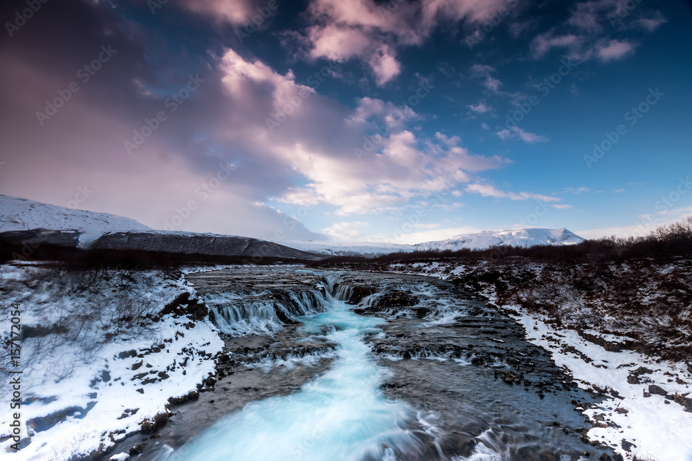 beautiful Bruarfoss waterfall with turquoise water beautiful Bruarfoss waterfall with turquoise water