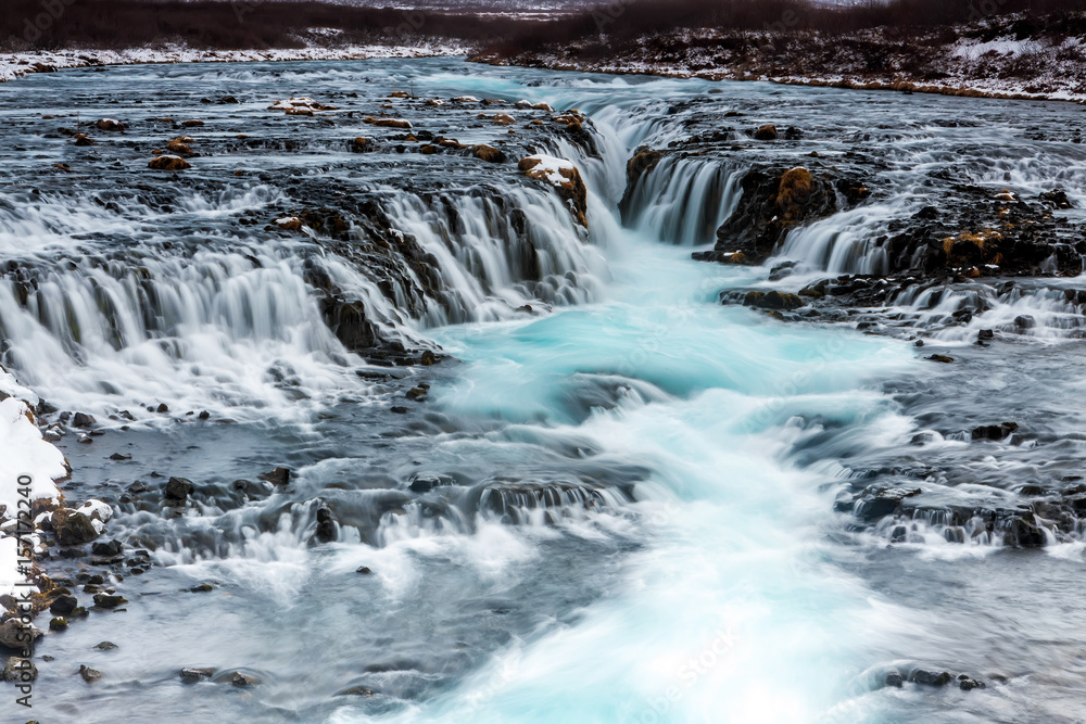 beautiful Bruarfoss waterfall with turquoise water beautiful Bruarfoss waterfall with turquoise water
