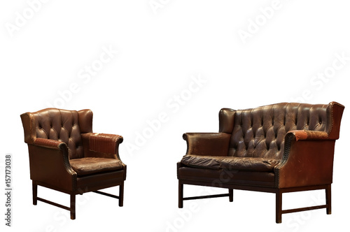 Damage and old brown leather sofa isolated, clipping path included. © ZhouEka