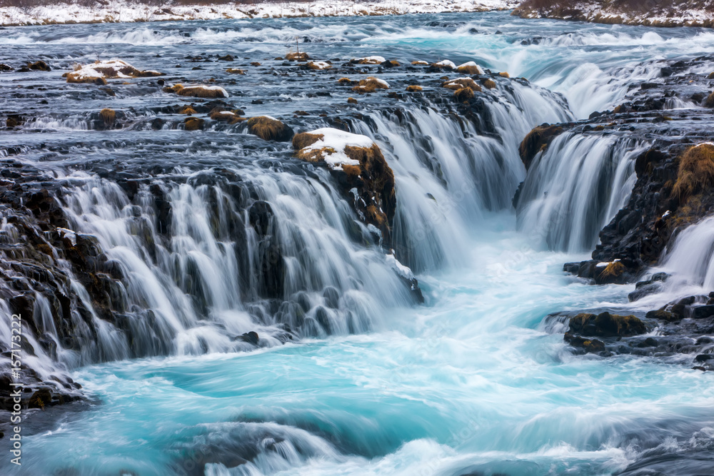 beautiful Bruarfoss waterfall with turquoise water beautiful Bruarfoss waterfall with turquoise water