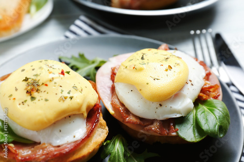 Photos Tasty eggs Benedict on plate