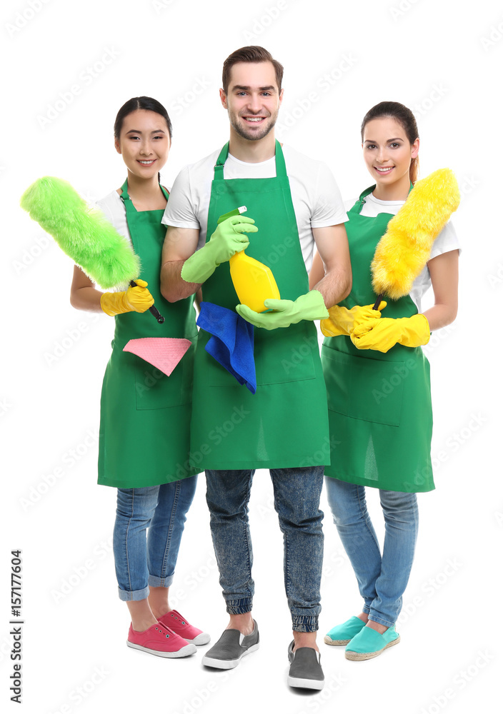 Cleaning service team in green aprons on white background Cleaning service team in green aprons on white background
