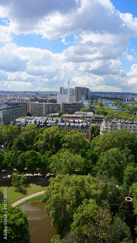 Aerial view of city of Paris from Eiffel tower with beautiful scattered clouds, Paris, France