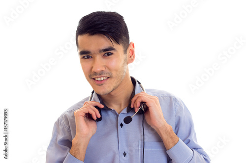 Young man using headphones  photo