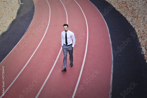 Businessman on the running track