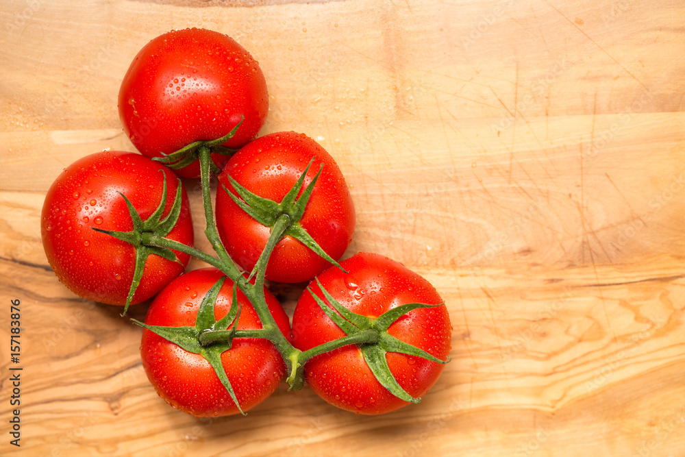 Red fresh tomatoes isolated on white background Red fresh tomatoes isolated on white background